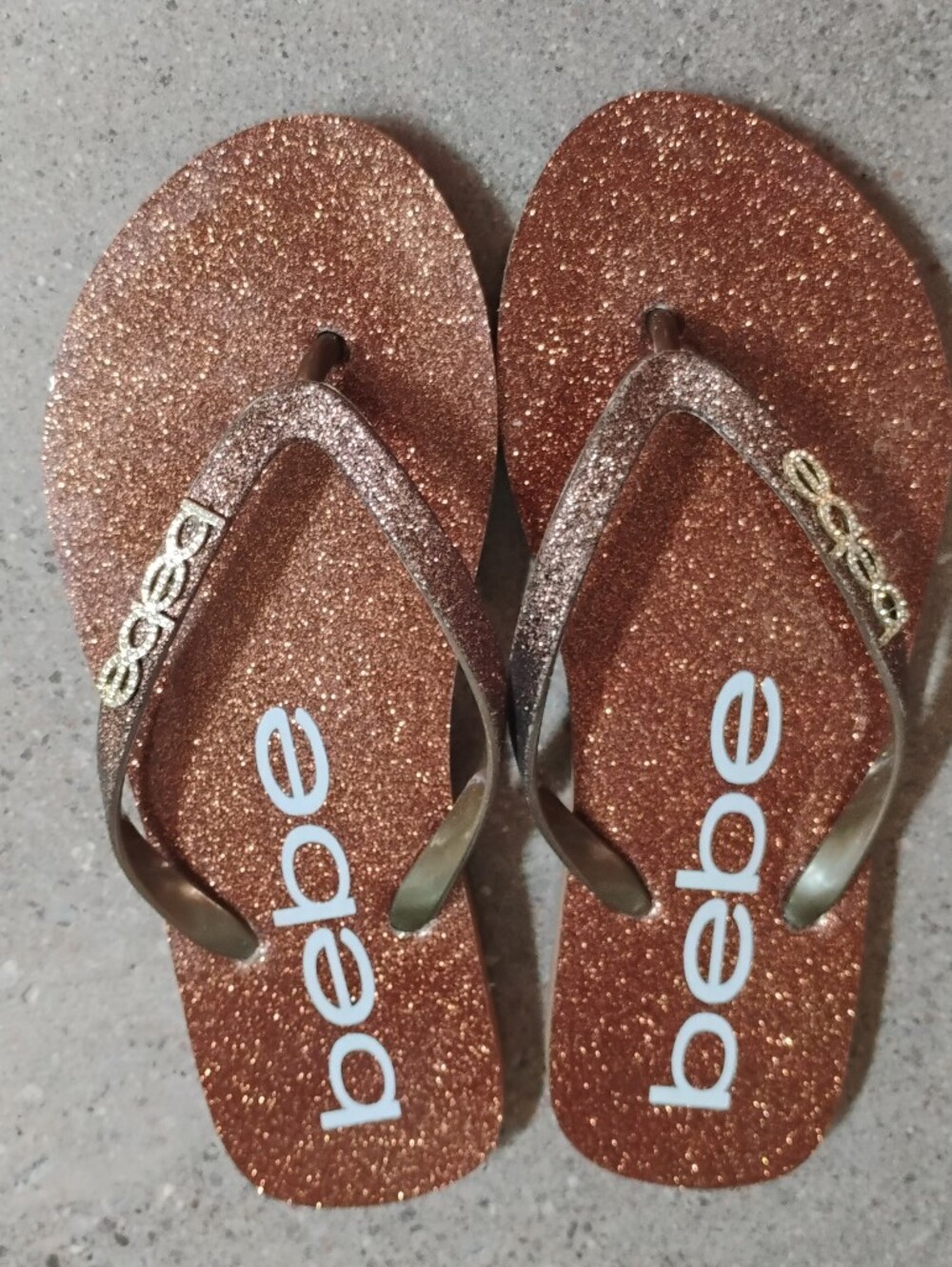 BEBE Glitter Flip Flop Sandals in Bronze